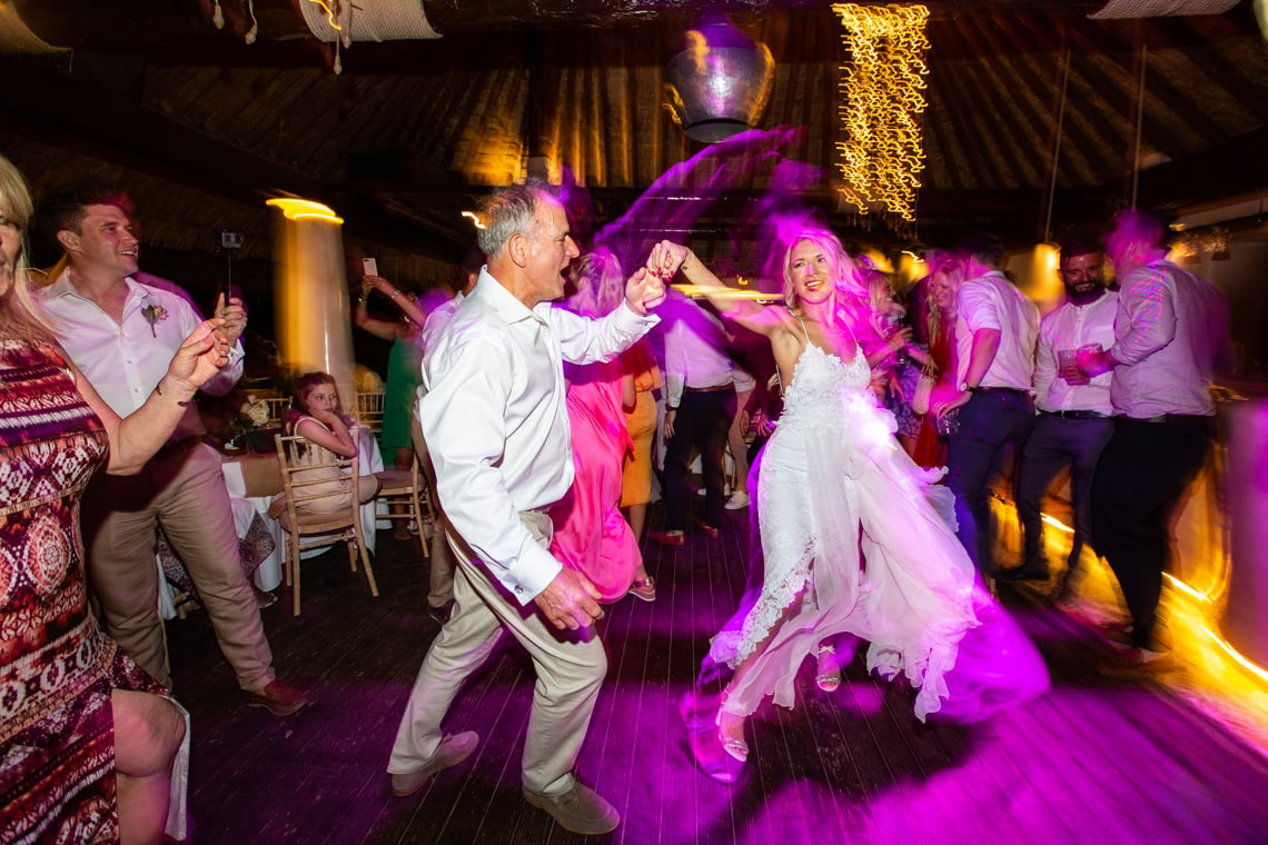 Photographer in Oia: bride dancing with her father