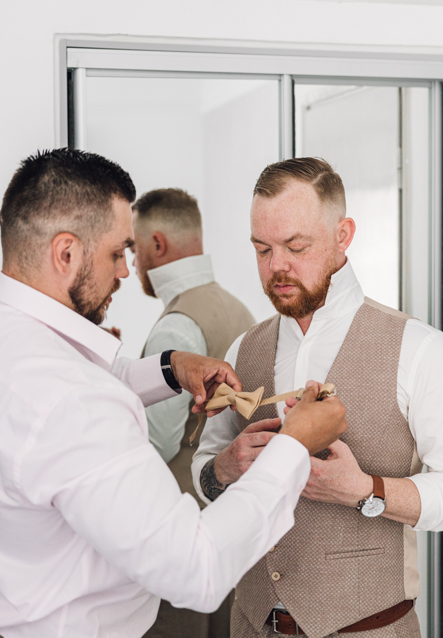 groom preparation photo shooting Fira