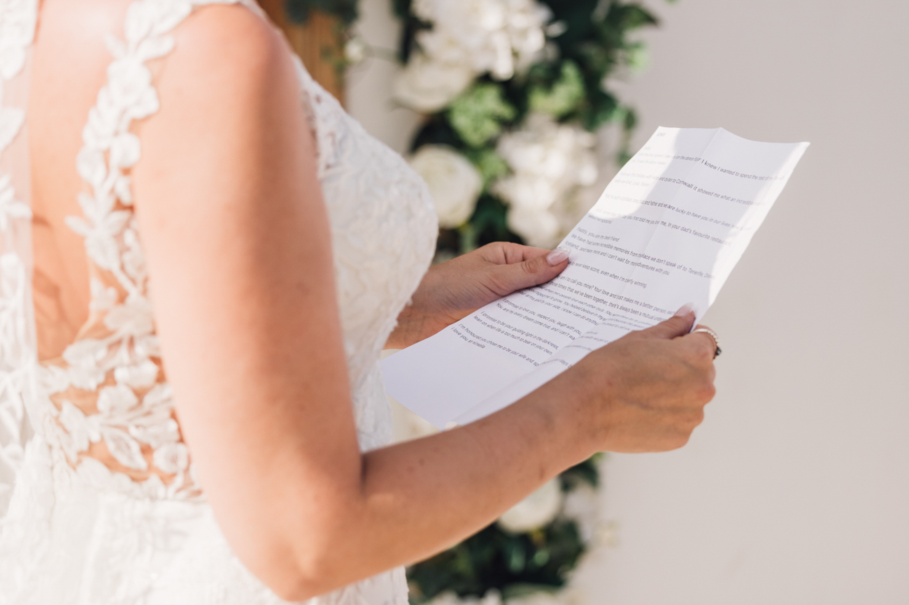 Bride reading her vows during the ceremony