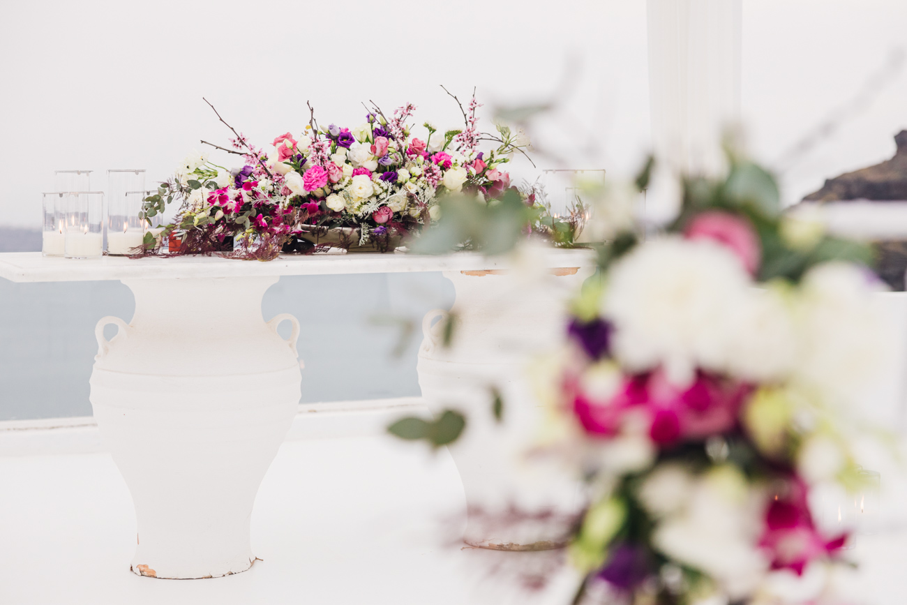 Elegant wedding table centerpiece with white roses and candles, Dana Villa Venue